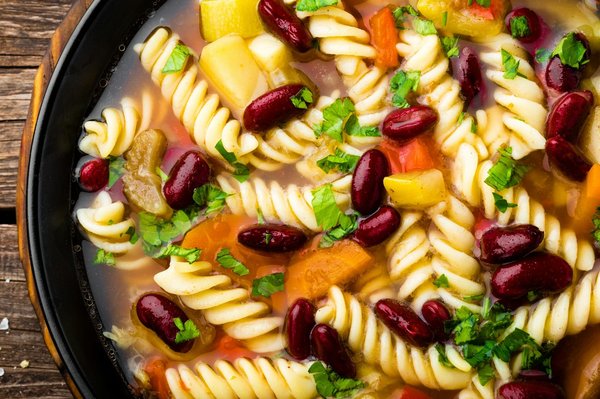 Can You Craft a Gourmet Roasted Red Pepper and Tomato Soup with a Pesto Drizzle?